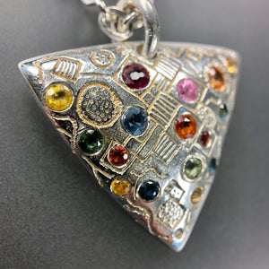 Silver and fancy multi-color sapphires trillion necklace