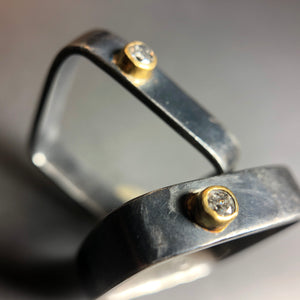 Distinctive gold and diamond ring.  Size 7.5