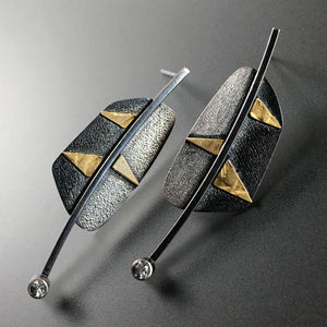 Leaf silver, gold, and white topaz earrings