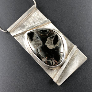 Necklace with fossilized ammonite