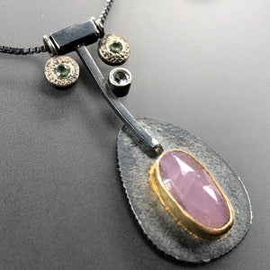 Blush sapphire set in 14K gold necklace