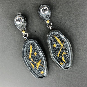Japanese pattern earrings in 23.5K gold, sterling silver, and white topaz