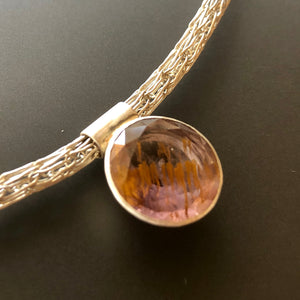 Round goethite on viking chain